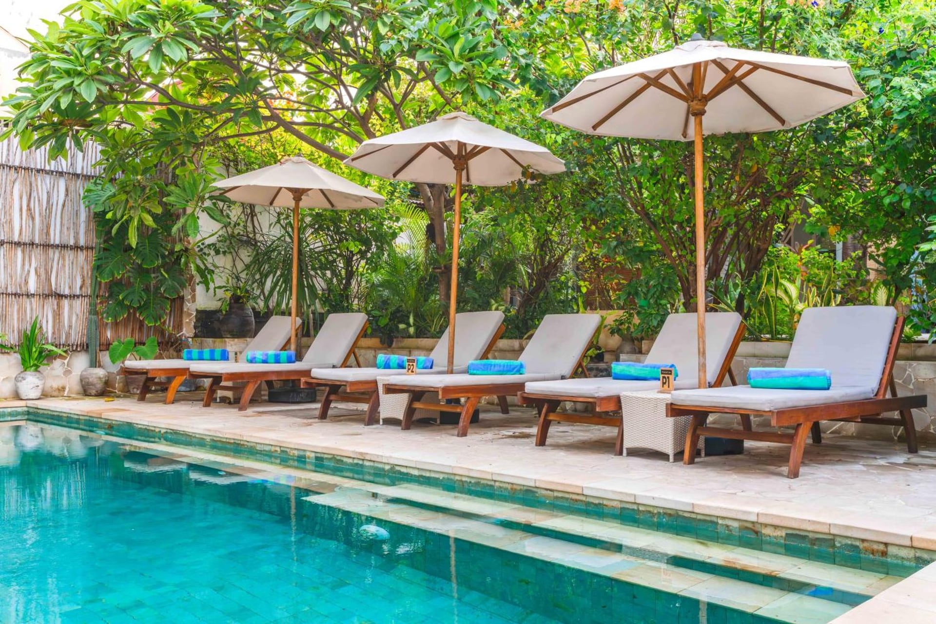 Pool loungers at Balé Sampan